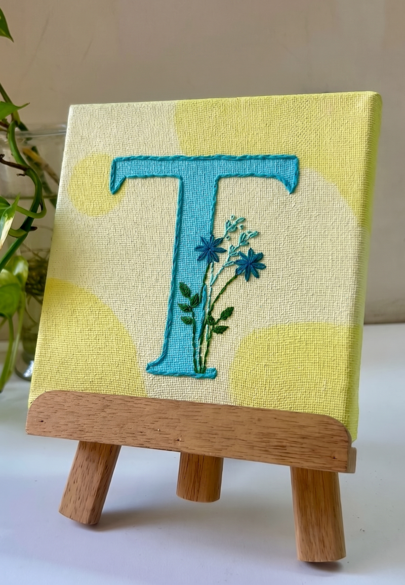Floral initial hand-embroidered personalised mini painting by Artaesthic